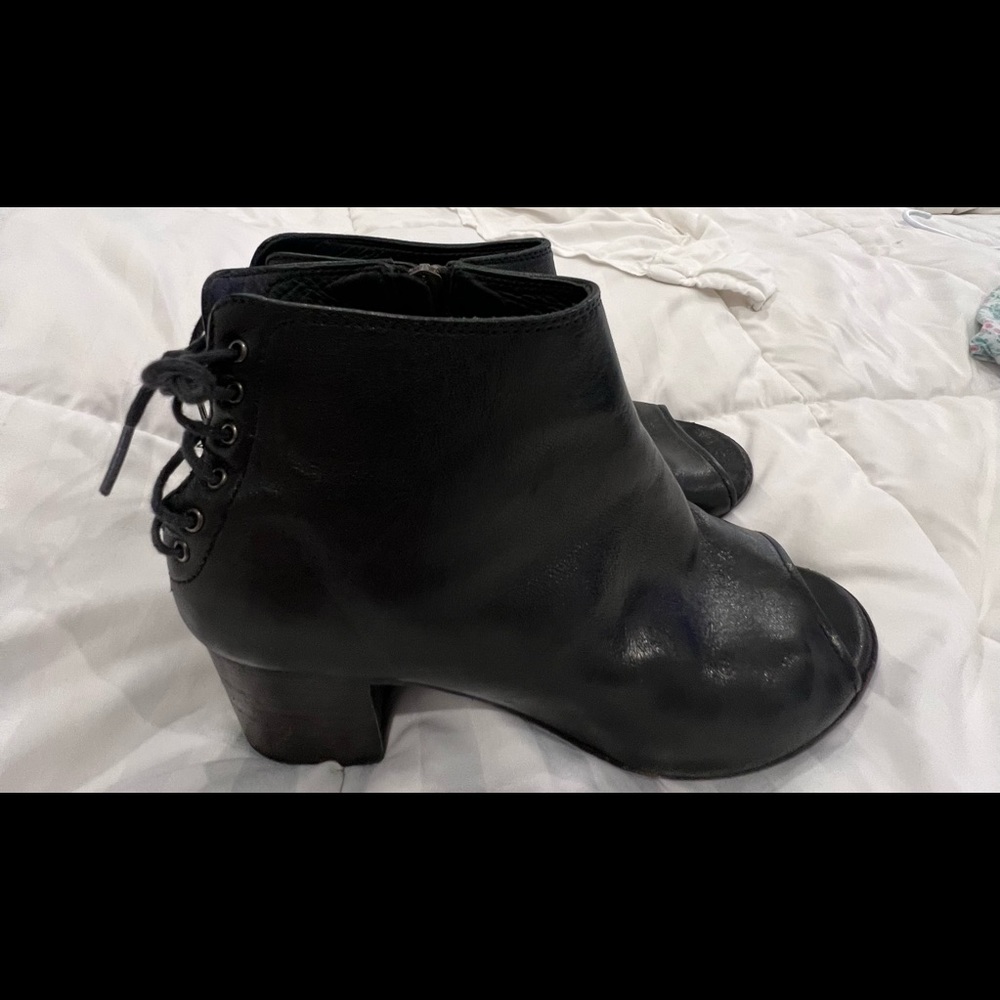 Black zip open toed booties.  Size 38